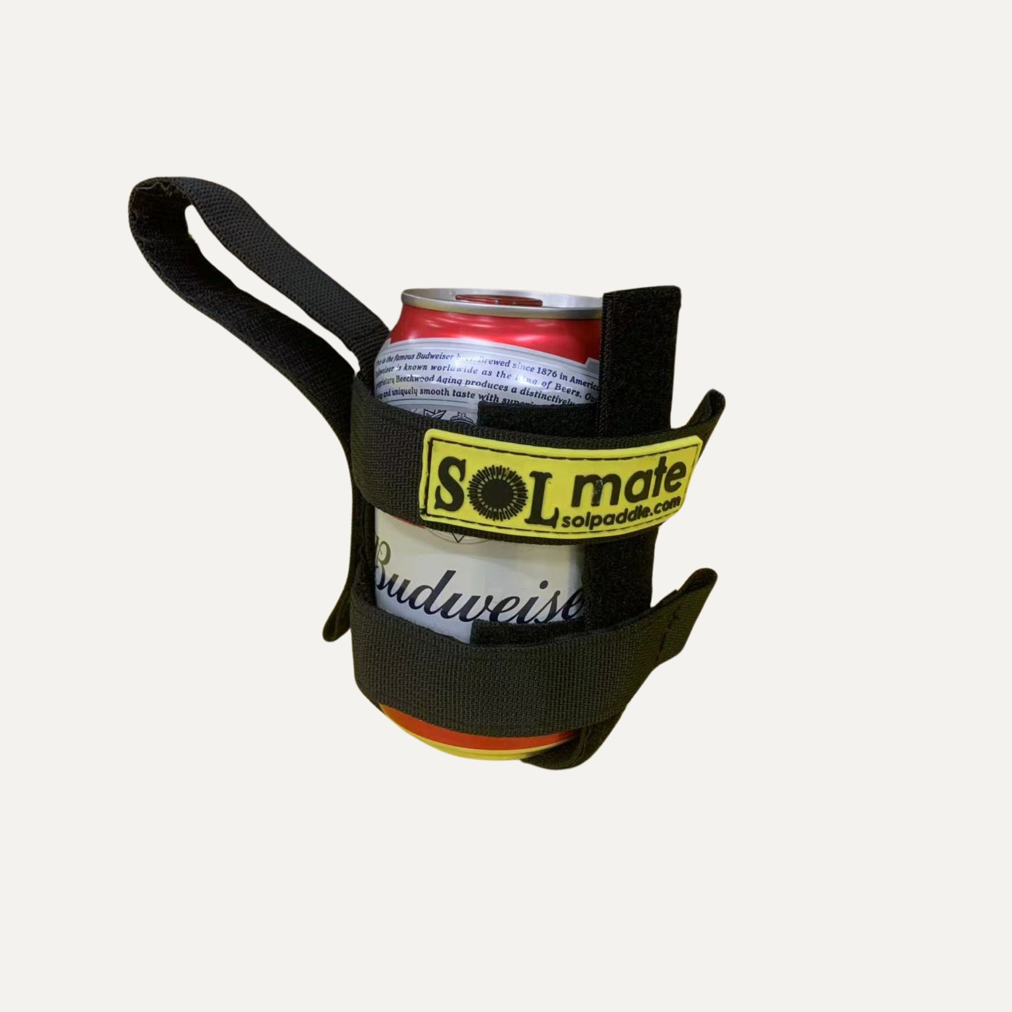 A close-up view of the SOLmate can holder, designed to hold a can of Budweiser. The holder features sturdy straps and a SOLmate logo, highlighting its functionality and brand identity.