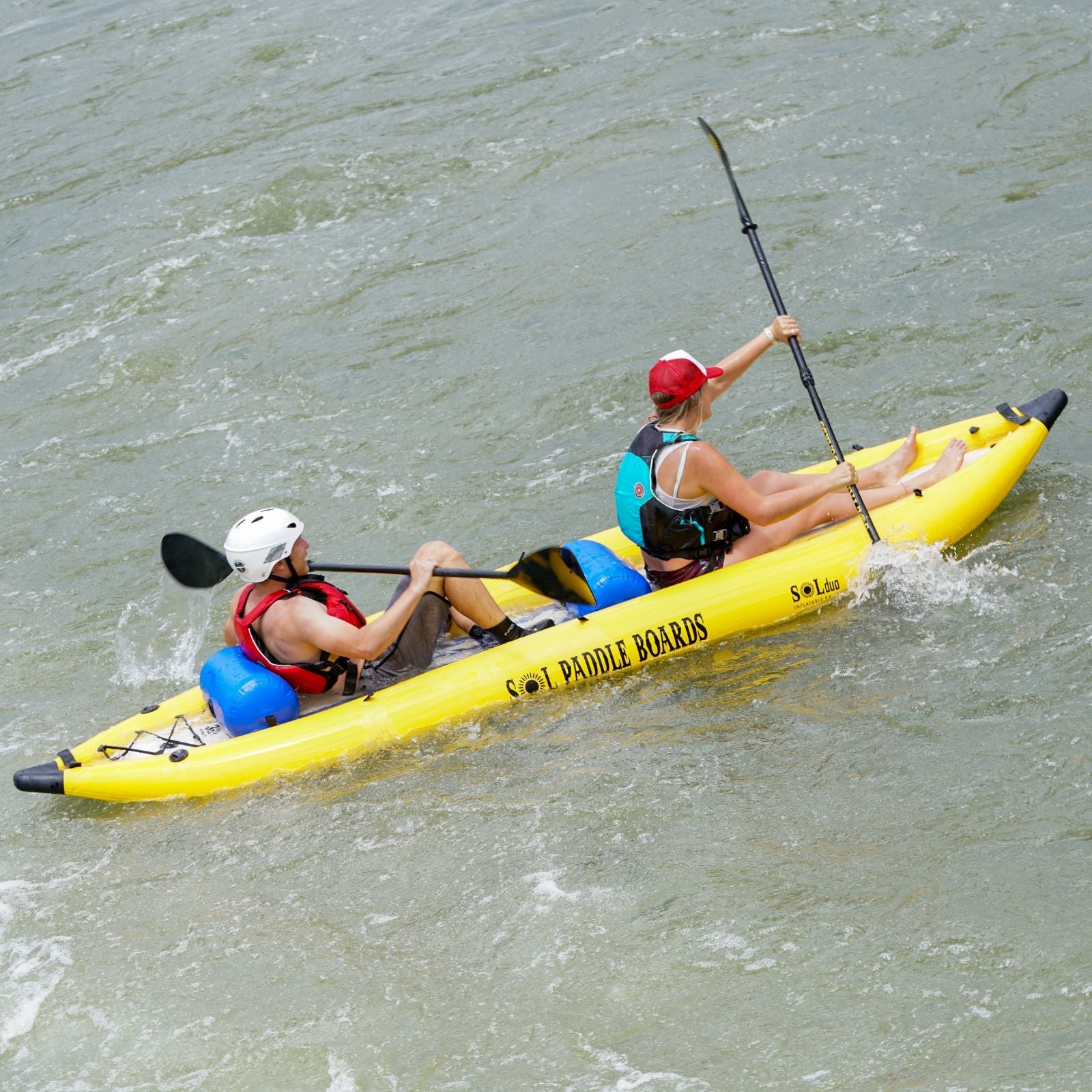 SOL Paddle Board Kayak on the water.